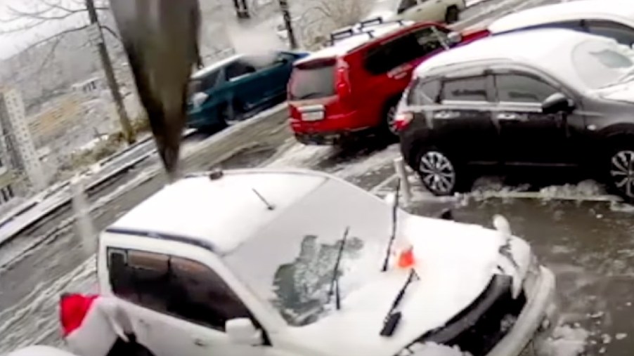 Driver from Russia in viral YouTube video miraculously escapes a giant concrete slab that hit his car