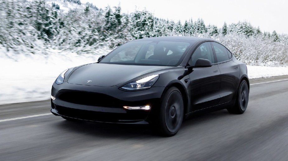 Front angle view of black 2023 Tesla Model 3, only Tesla electric car recommended by Consumer Reports in 2023