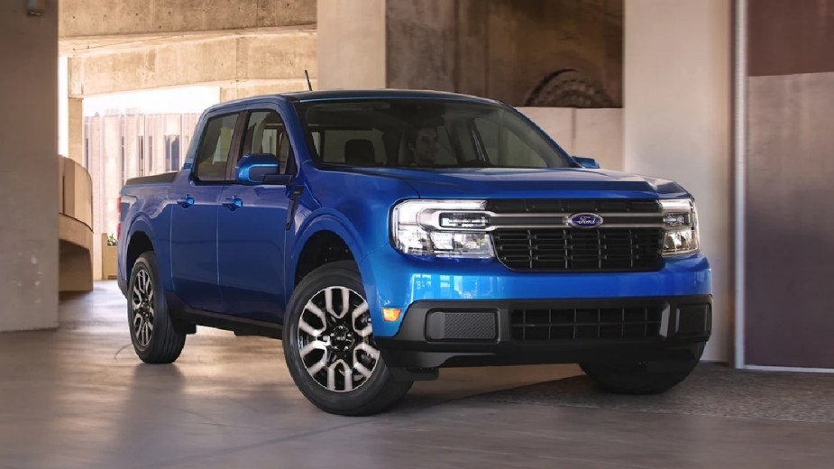 Front angle view of blue 2023 Ford Maverick compact pickup truck