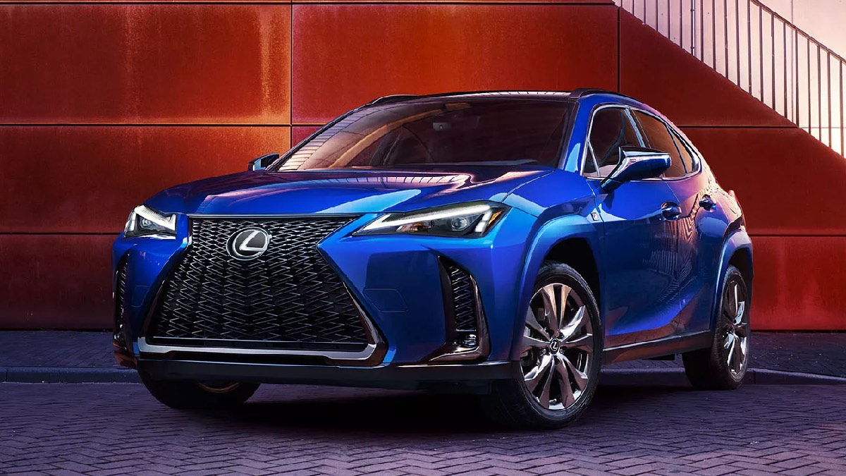 Front angle view of blue 2023 Lexus UX hybrid luxury SUV, cheapest new Lexus car with high gas mileage