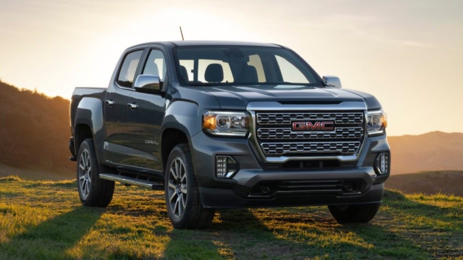 Front angle view of gray 2022 GMC Canyon pickup truck, the cheapest new GMC car