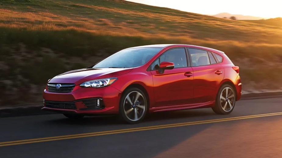 Front angle view of reliable 2023 Subaru Impreza, affordable new car under $20,000 recommended by Consumer Reports