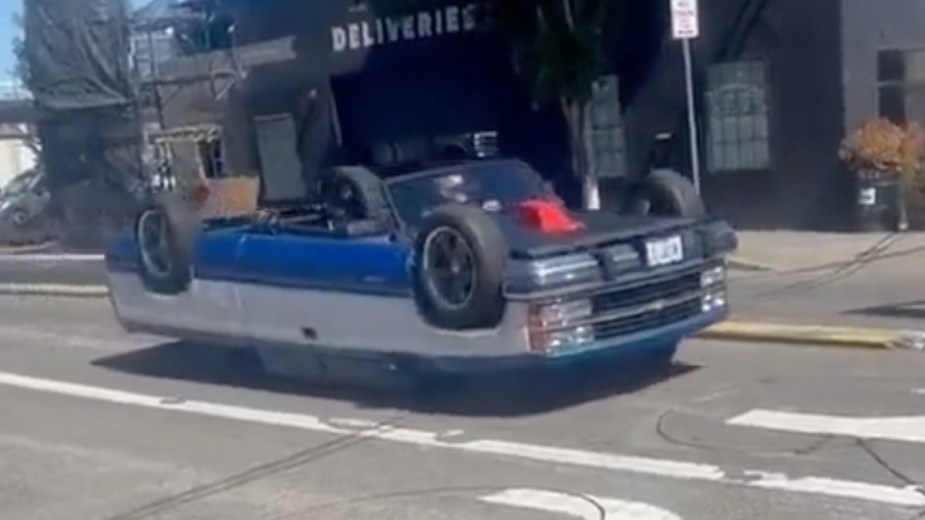 A front angle view of an overturned Chevy pickup truck in a video that went viral on Twitter