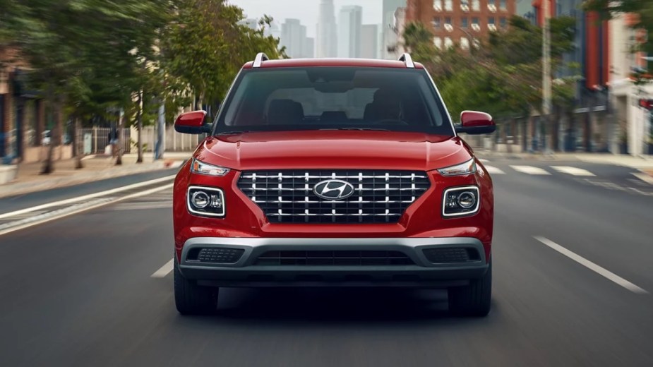 Front view of red 2023 Hyundai Venue, cheapest new Hyundai car and most affordable SUV in America