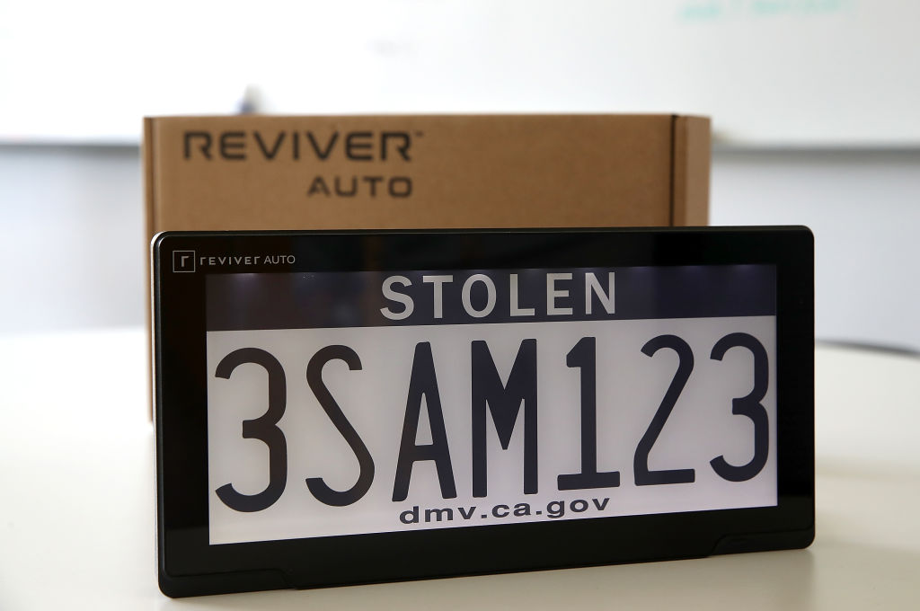 A digital license plate displaying STOLEN status 