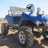 off-road golf cart in the dirt. How much do you have to spend to get a good golf cart?