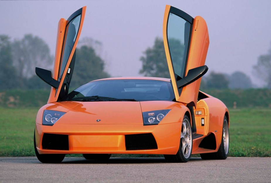 This orange Lamborghini Murcielago supercar would lose a race to 60 MPH to a Rivian electric pickup truck