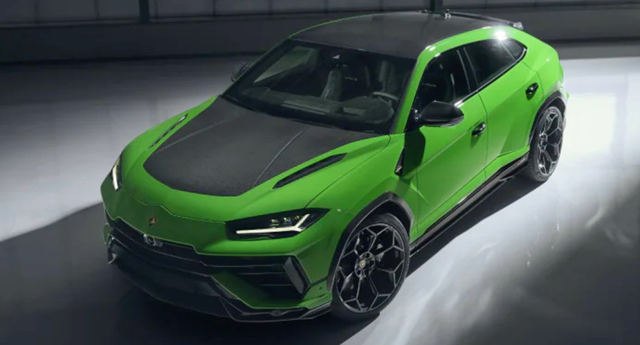 A green 2023 Lamborghini Urus Performante luxury SUV is parked. 