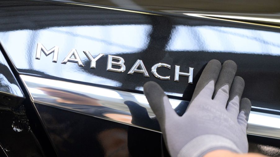 Maybach badging attached to a Mercedes-Benz model during vehicle assembly in Sinfelfingen, Germany