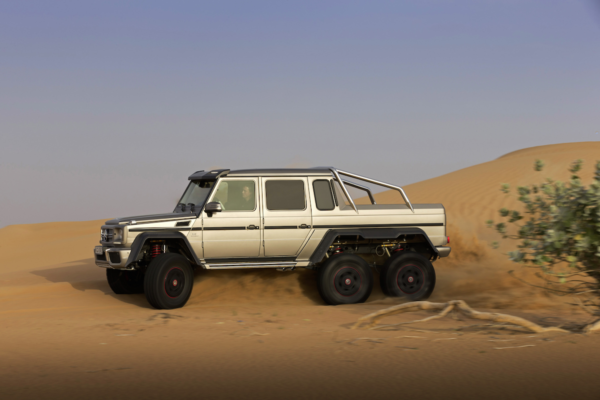 A gray Mercedes-Benz G 63 AMG 6x6 truck in the dessert.