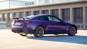 A purple BMW M4 Competition, one of the best winter sports cars