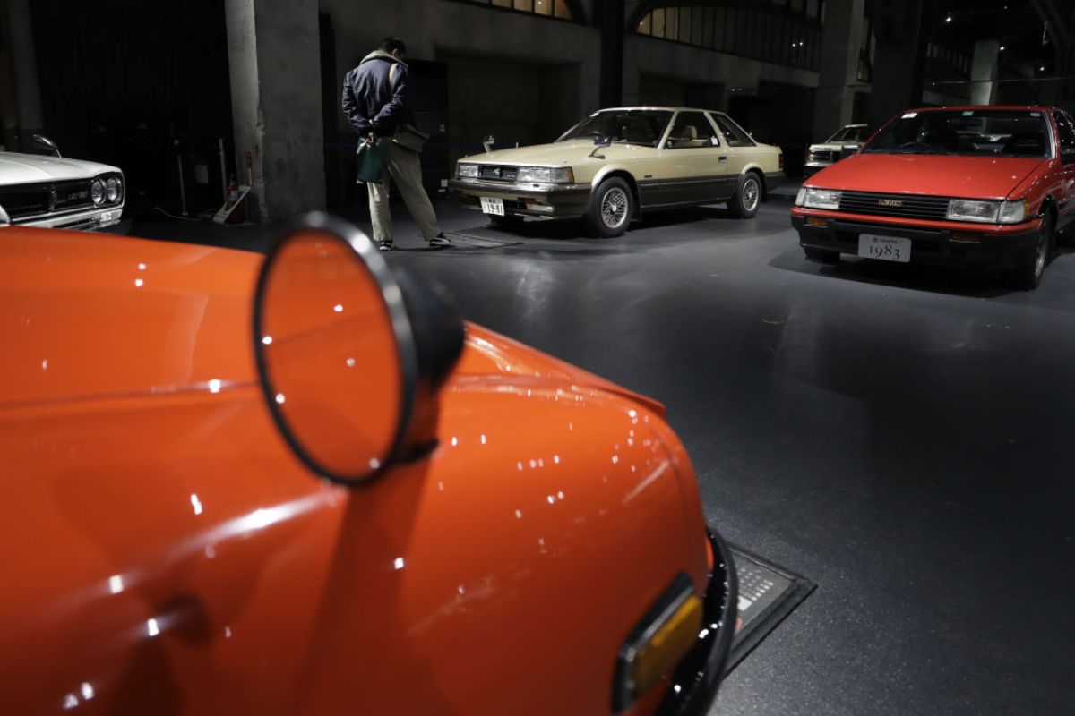 A Toyota Soarer on display inside a museum.