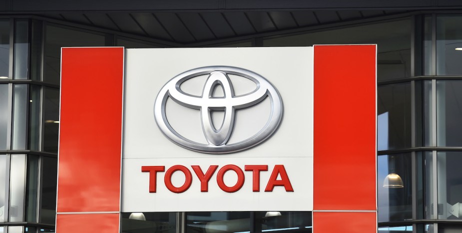 A Toyota logo on a sign. 