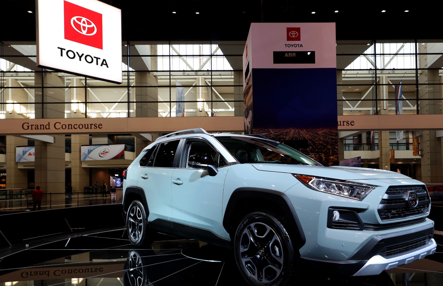 Toyota tune-up costs on an SUV like this white RAV4 are affordable