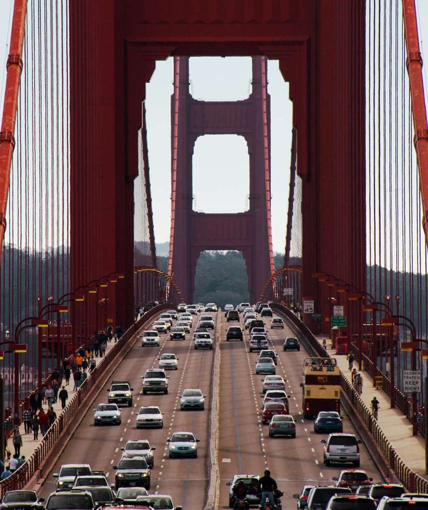 Traffic on the Golden Gate Bridge, highlighting the number of car owners in the world