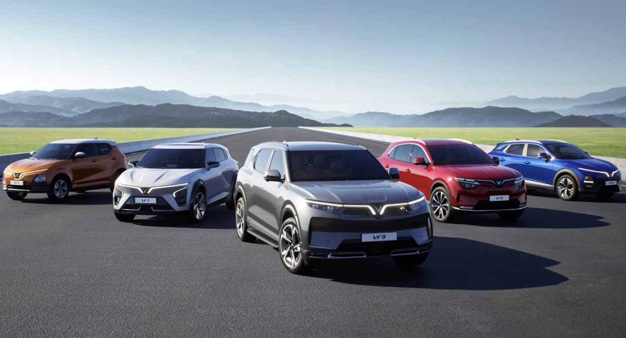 Five VinFast SUVs are parked. 
