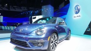 A blue Volkswagen Beetle, which is one of the most reliable Volkswagen models.