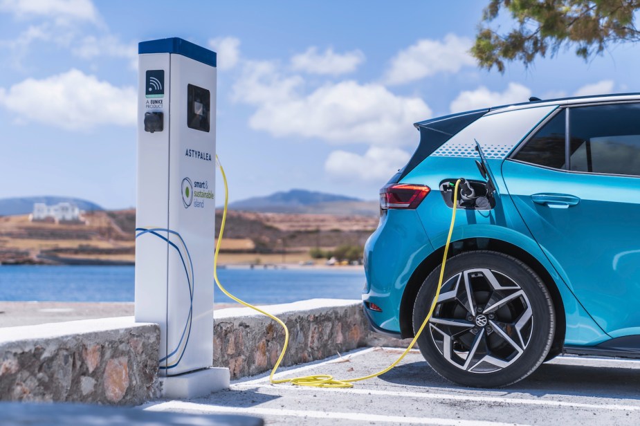 Closeup of a Volkswagen ID.4 EV charging on an island.