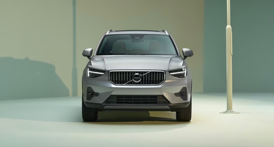 A gray 2022 Volvo XC40 small SUV is parked. 