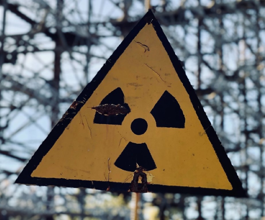 Yellow and black radiation sign, highlighting radioactive device that fell off truck in Australia