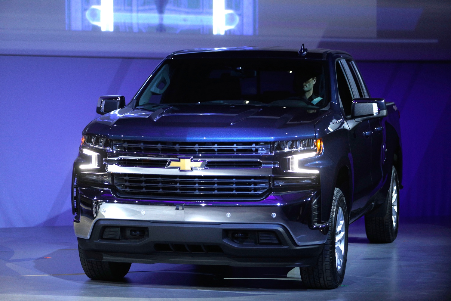The best full size truck for the money include this Chevrolet Silverado at an auto show