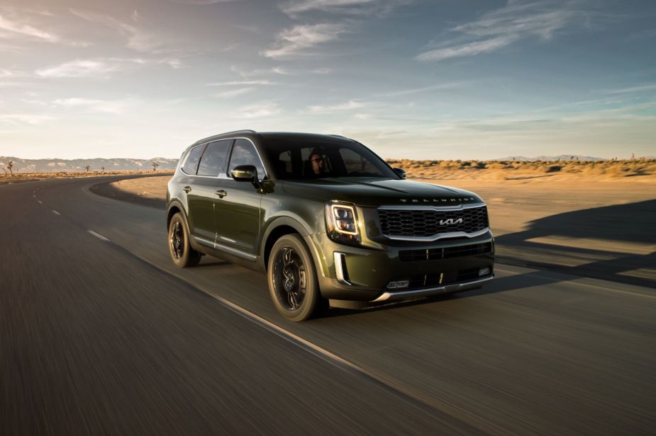 A dark forest green 2022 Kia Telluride, has one of the best SUV warranties for 2023.
