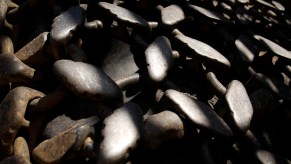 A set of tire chains on tires.