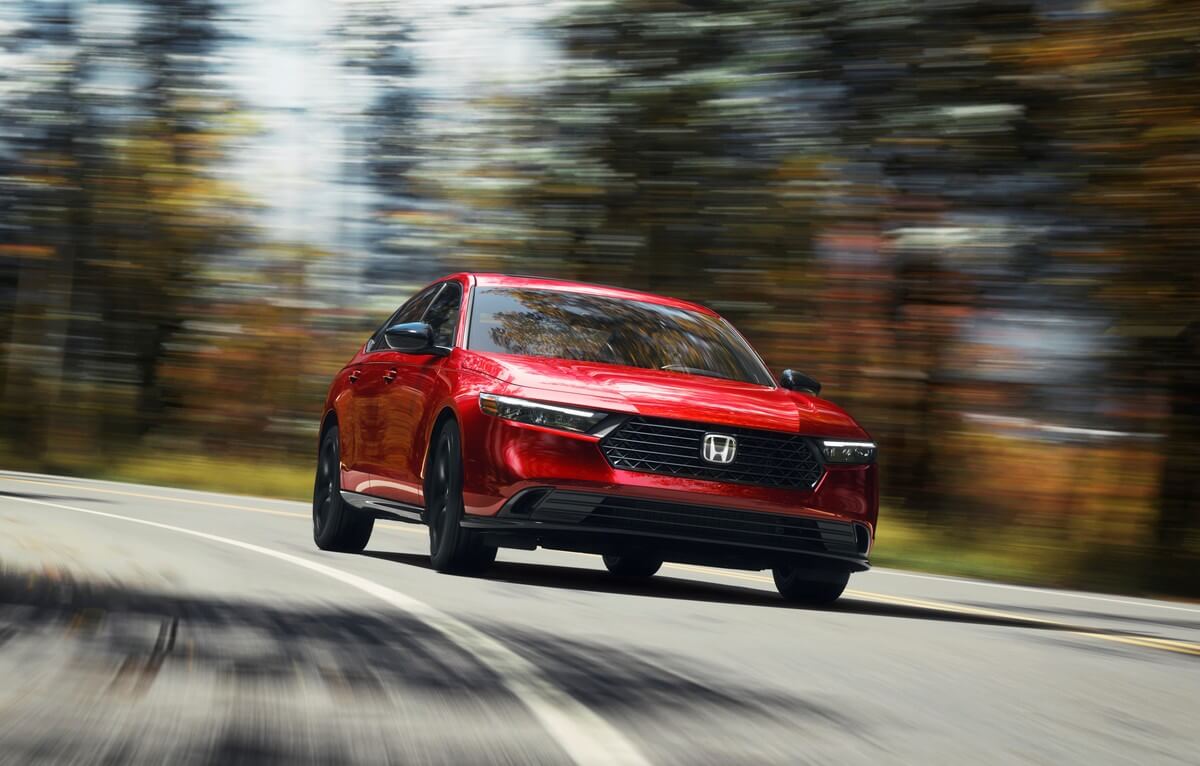 The new Honda Accord Hybrid in red