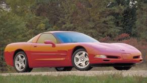 A red-orange fifth generation (C5) 1997 Chevrolet Corvette Coupe