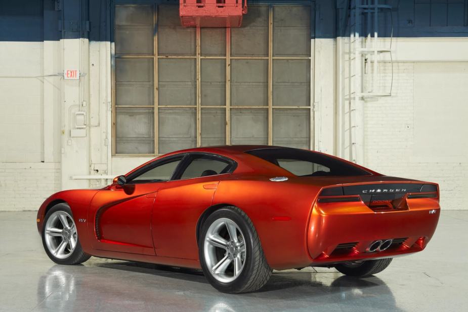 Promo of the retro rear quarters of a orange Dodge Charger R/T concept car from 1999 that inspired the 2005 production car.