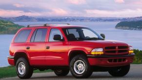 A red 2000 Dodge Durango 4x4 Sport midsize SUV model