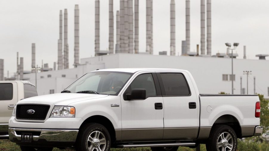 A cheap white 2006 Ford F-150 like this fleet pickup truck can sell at military surplus vehicle auctions or used car lots.