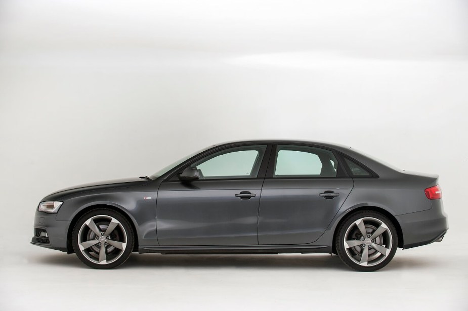A gray 2013 Audi A4 shows off its side profile. 