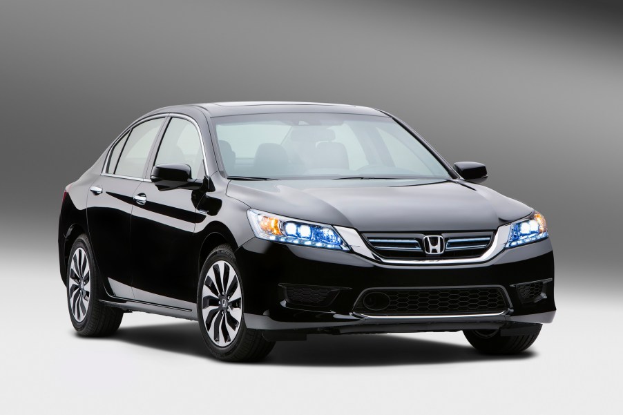 A used 2014 Honda Accord shows off its black paint work and fascia.