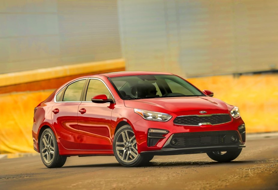 A red 2020 Kia Forte parked in a lot