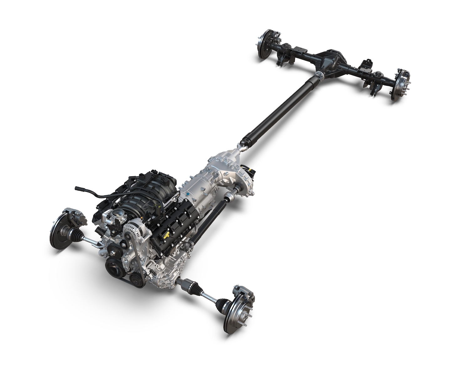 This is the isolated drivetrain of a Ram 1500 pickup truck with axles, transmission, and engine that sometimes suffers coolant leaks against a white backdrop.