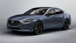 A gray used Mazda6 shows off its 6 series styling, including a stylish fascia.