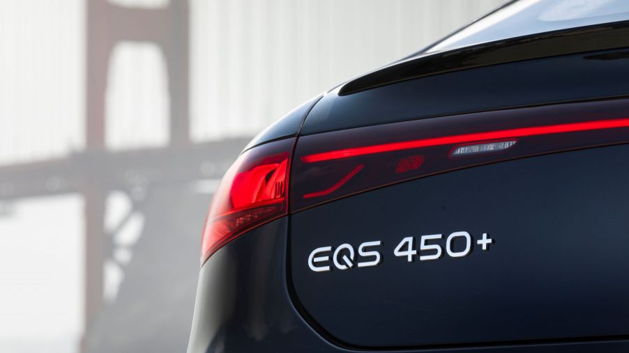 2022 Mercedes-Benz EQS 450+ rear badging with the Golden Gate Bridge in the background