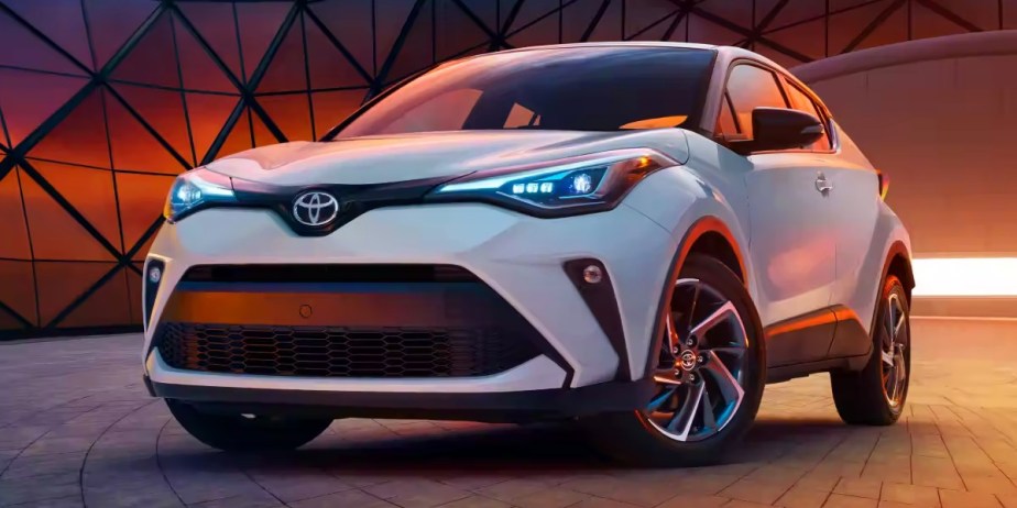 A white 2022 Toyota C-HR subcompact SUV is parked. 