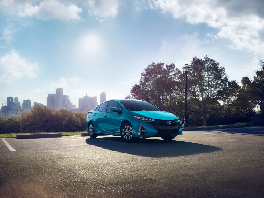 A Toyota Prius Prime parks in a compact car spot while it shows off its hatchback styling and practicality. 