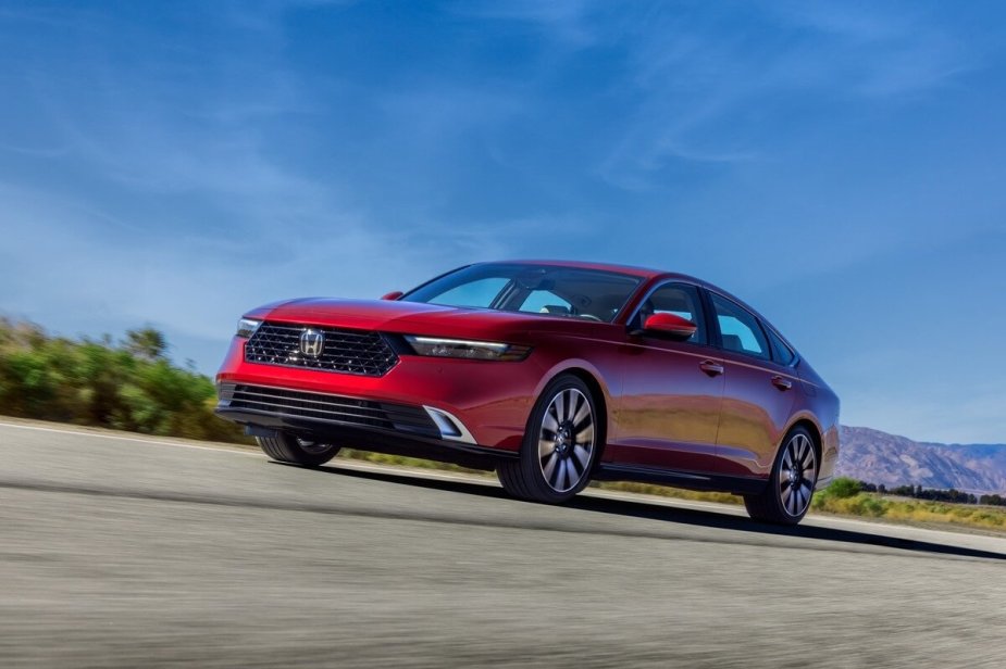 A 2023 Honda Accord shows off its red paintwork and redesigned front-end styling. 