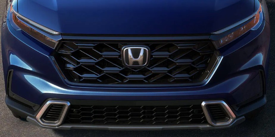 The front of a blue 2023 Honda CR-V small SUV . 