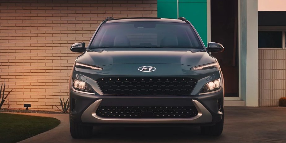 A black 2023 Hyundai Kona subcompact SUV is parked. 