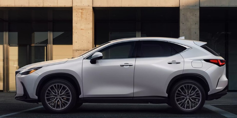 A white 2023 Lexus 350h small hybrid SUV is parked. 