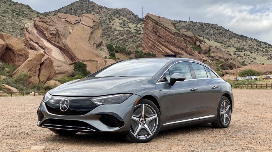 2023 Mercedes-Benz EQE All-Electric Luxury Sedan parked in front of a rocky hillside