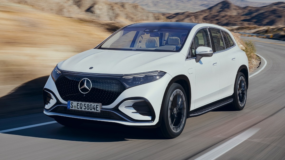2023 Mercedes-Benz EQS All-Electric Luxury SUV driving around a curve