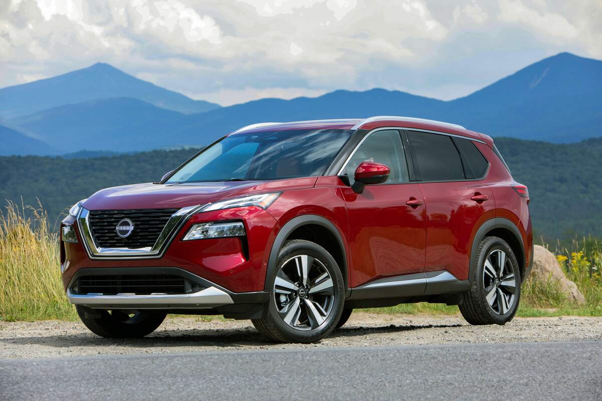 A red 2023 Nissan Rogue on display