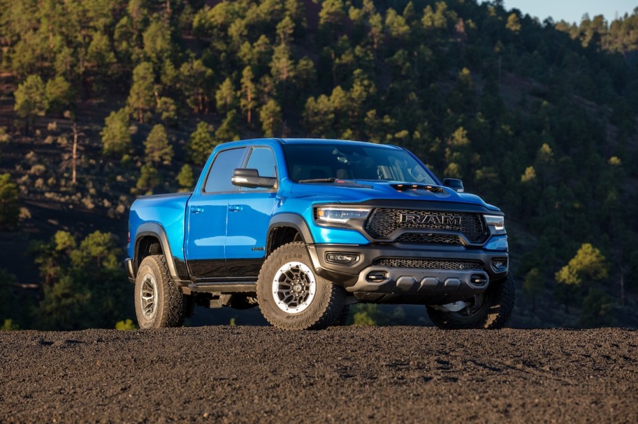 A blue 2023 Ram 1500 parked outdoors.