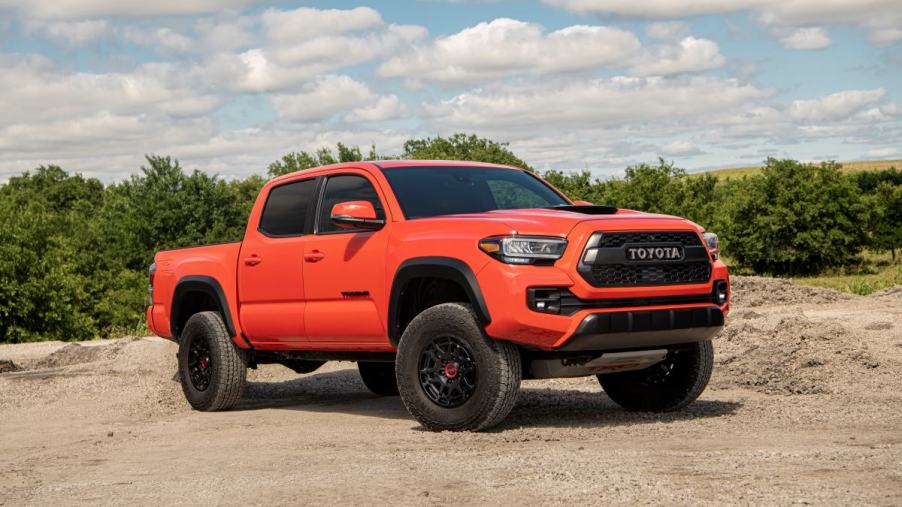 A 2023 Toyota Tacoma parked on a trail.