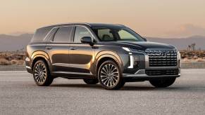 The 2023 Hyundai Palisade parked in gravel